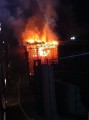 Pożar zwykłej siatki na rusztowaniu.